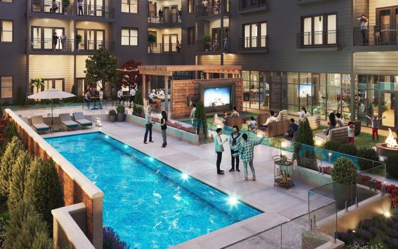 a pool in a courtyard between buildings