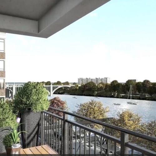 a building with a body of water in the front